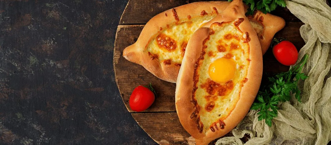 Adjarian khachapuri with cheese and egg